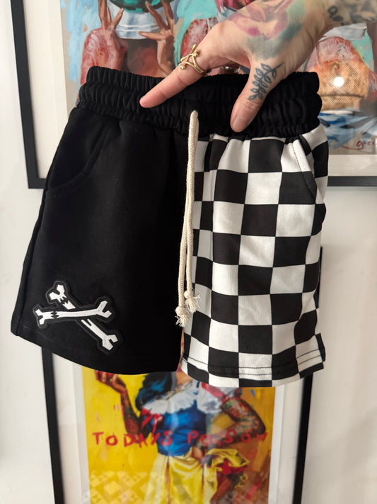 One off pair of kids checker board shorts